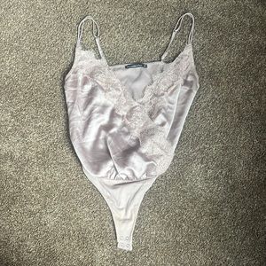 Abercrombie and Fitch silk bodysuit with lacy plunging V-neck